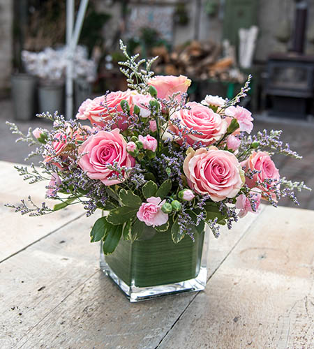 pink flower bouquet in a square vase
